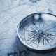 Compass and road map symbolizing how a marketing strategy defines what is possible and gives the roadmap for achieving it.