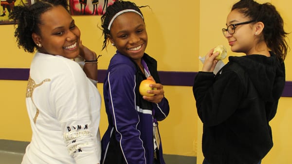 Students from Cristo Rey Kansas City learned about healthy food choices through the Dobies Health Marketing Apple a Day program