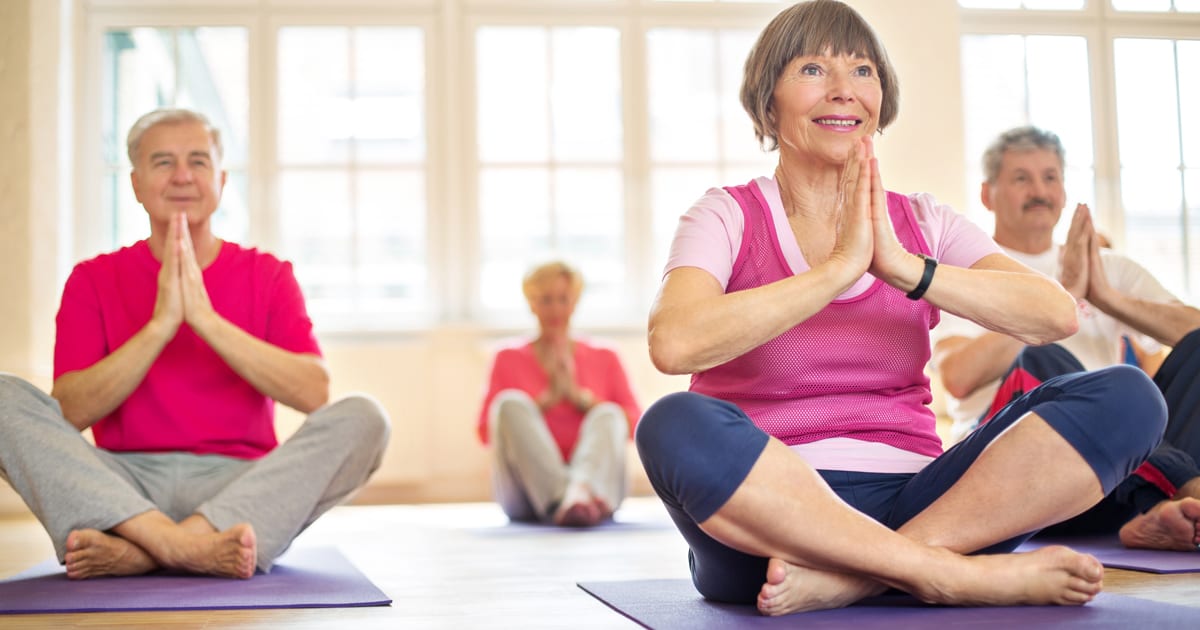 Image of people in a yoga class